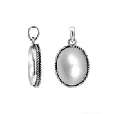 Sterling silver oval pendant with mother of pearl and twisted rope silver frame handcrafted in Bali